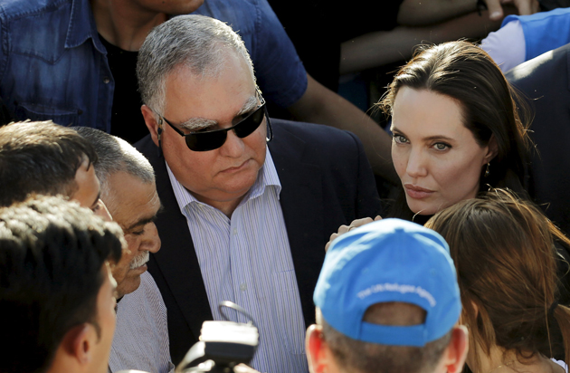 United Nations High Commissioner for Refugees Special Envoy Angelina Jolie is surrounded by Yazidi refugees, officials and media members as she visits a Syrian and Iraqi refugee camp in the southern Turkish town of Midyat