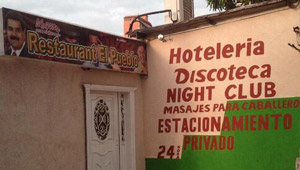 ¡QUEJESTO!… Restaurant, discoteca y masajes para caballeros (con la foto de Maduro)