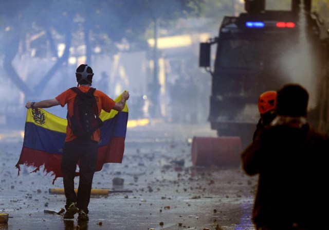  Protestas en Caracas el  15 de febrero, 2014 (AFP PHOTO/ JUAN BARRETO