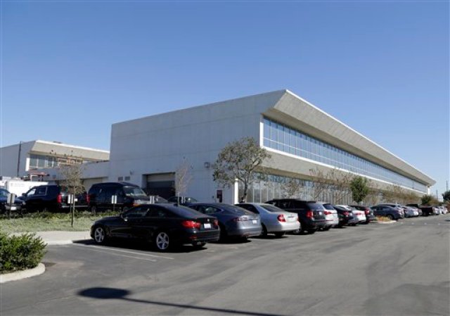 El futuro edificio de la empresa de vehículos eléctricos Faraday Future en Gardena, California, el 6 de noviembre de 2015. Faraday pretende instalar en Estados Unidos lo que describe como la fábrica de una nueva línea de coches a un coste de 1.000 millones de dólares y tiene el propósito de comercializar sus vehículos eléctricos en 2017. Al igual que la firma Tesla, los coches de Faraday serán eléctricos y se estrenarán con un alto precio. (AP Foto/Nick Ut)