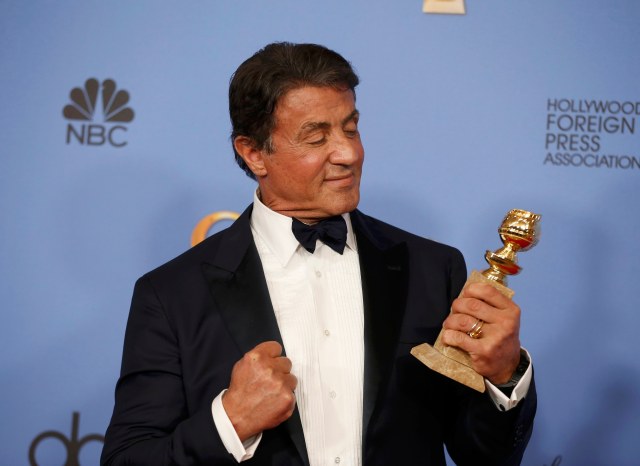 Sylvester Stallone poses backstage with the award for Best Performance by an Actor in a Supporting Role in any Motion Picture for his role in "Creed" at the 73rd Golden Globe Awards in Beverly Hills, California January 10, 2016. REUTERS/Lucy Nicholson
