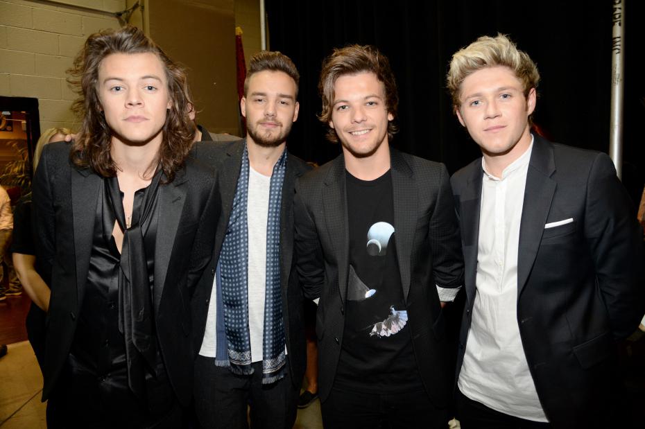 Integrante de “One Direction” presenta a su bebé (FOTO)