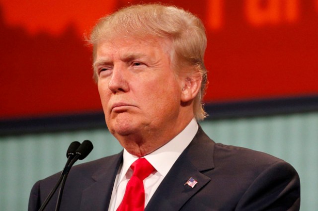 Republican 2016 U.S. presidential candidate businessman Donald Trump listens to a question at the first official Republican presidential candidates debate of the 2016 U.S. presidential campaign in Cleveland, Ohio, August 6, 2015. REUTERS/Brian Snyder  - RTX1NEFT