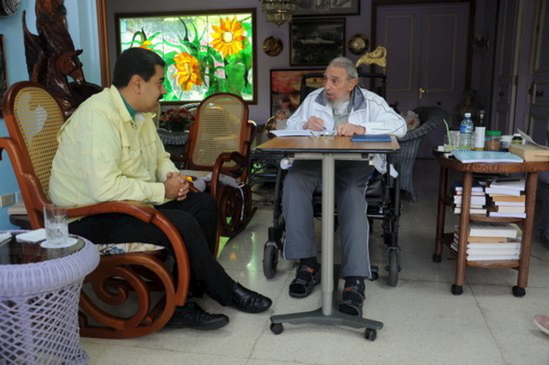 Handout picture of Cuba's former President Fidel Castro and Venezuela's President Nicolas Maduro while meeting in Havana