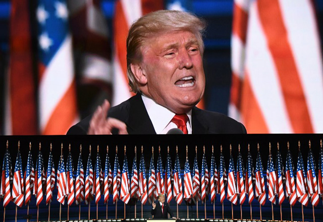 US Republican presidential candidate Donald Trump speaks on the last day of the Republican National Convention on July 21, 2016, in Cleveland, Ohio. / AFP PHOTO / JIM WATSON