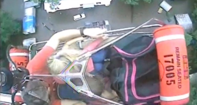 An aircrew from Coast Guard Air Station New Orleans rescues three people from a rooftop due to flooding in Baton Rouge, Louisiana, U.S., in this still image from video taken on August 13, 2016. Coast Guard Air Station New Orleans/Handout via REUTERS ATTENTION EDITORS - THIS IMAGE WAS PROVIDED BY A THIRD PARTY. EDITORIAL USE ONLY