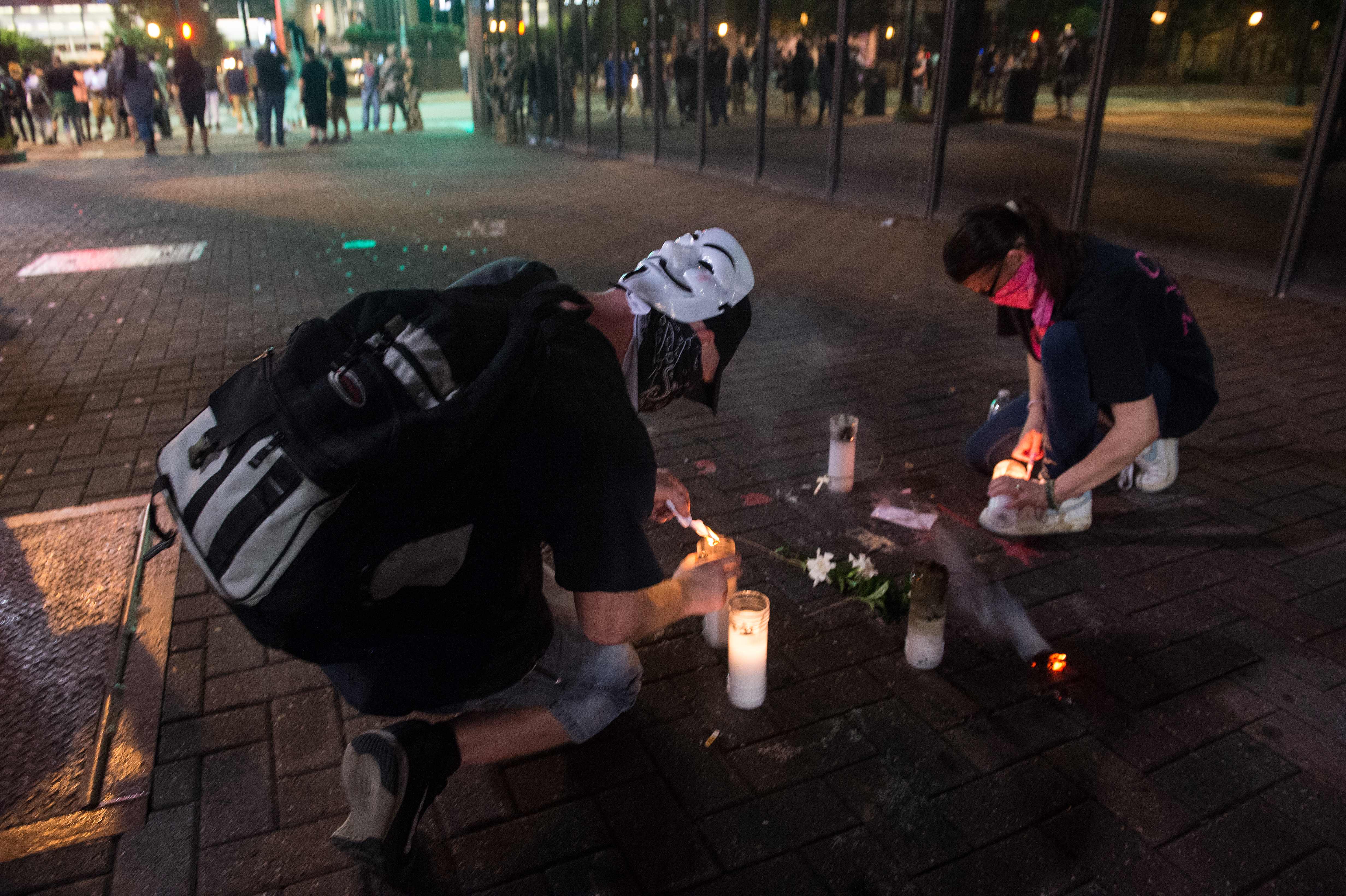 Esposa de joven afrodescendiente muerto por policía en Charlotte publica video