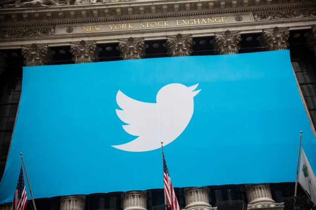 (FILES) This file photo taken on November 6, 2013 shows the Twitter logo displayed on a banner outside the New York Stock Exchange (NYSE) in New York. US stocks rose early October 5, 2016 with petroleum-linked shares rallying on higher oil prices and Twitter advancing on a report it is closer to being sold. Devon Energy rose 1.5 percent and Marathon Oil 1.8 percent as oil prices jumped ahead of a weekly US petroleum inventory report. Twitter gained 4.1 percent after the Wall Street Journal reported the social media company is expected to receive takeover bids this week. Possible suitors include Salesforce.com, Google and Disney.  / AFP PHOTO / GETTY IMAGES NORTH AMERICA / Andrew Burton