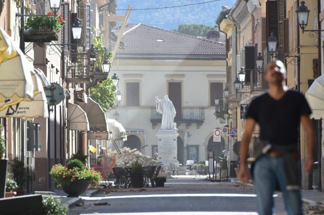 AFP PHOTO / ALBERTO PIZZOLI