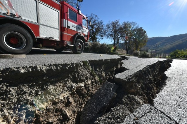 AFP PHOTO / ALBERTO PIZZOLI