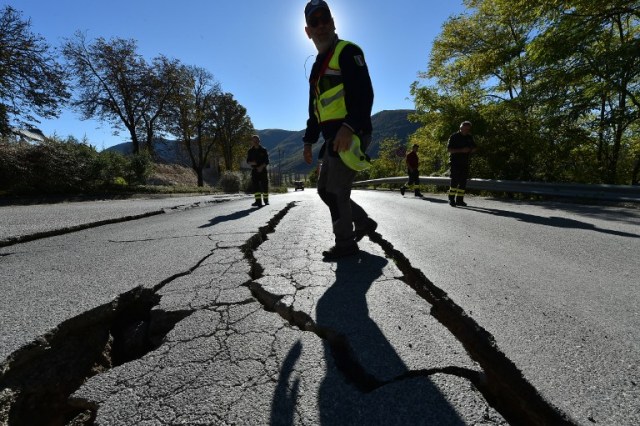 AFP PHOTO / ALBERTO PIZZOLI