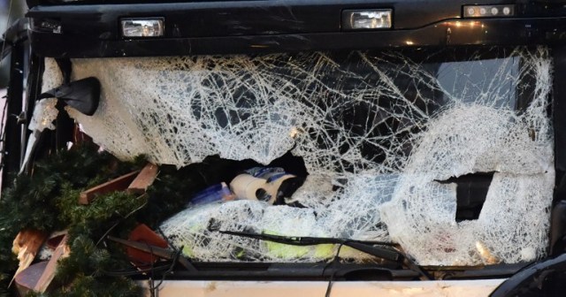 The broken wind shield of a truck that crashed into a Christmas market near the Kaiser-Wilhelm-Gedaechtniskirche (Kaiser Wilhelm Memorial Church) in Berlin is pictured on December 20, 2016. German police said they were treating as "a probable terrorist attack" the killing of 12 people when the speeding lorry cut a bloody swath through the packed Berlin Christmas market. / AFP PHOTO / Tobias SCHWARZ