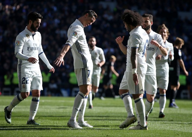 Football Soccer - Real Madrid v Granada - Spanish La Liga Santander - Santiago Bernabeu stadium, Madrid, Spain - 7/1/17 Real Madrid's Cristiano Ronaldo celebrates his first goal. REUTERS/Juan Medina