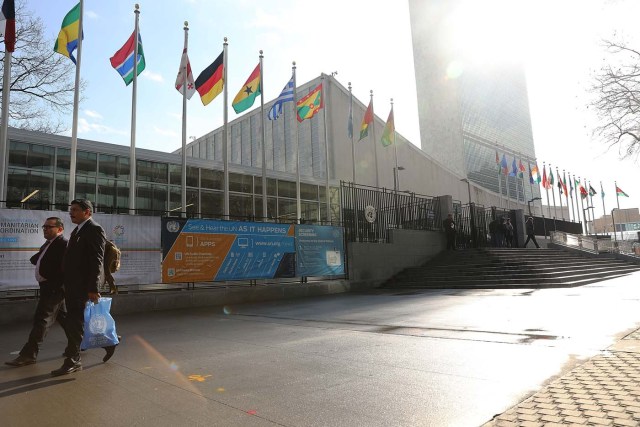 NEW YORK, NY - JANUARY 26: Pedestrians walk by the United Nations in midtown Manhattan on January 26, 2017 in New York City. President Donald Trump is preparing executive orders that would reduce US funding of the United Nations and other international organizations. The first order would cut funding for any U.N. agency or other international group that meets any specific criteria. Organizations and groups to receive cuts may include peacekeeping missions, the International Criminal Court and the United Nations Population Fund.   Spencer Platt/Getty Images/AFP