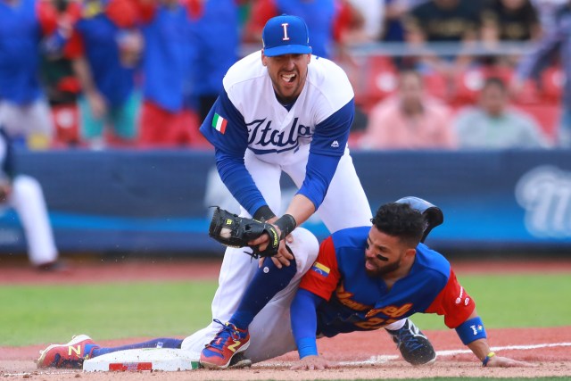 ZAPOPAN, MEXICO - MARCH 11: Jose Altuve #27 of Venezuela slides into third base to score in the top of the seventh inning during the World Baseball Classic Pool D Game 3 between Venezuela and Italy at Panamericano Stadium on March 11, 2017 in Zapopan, Mexico. Miguel Tovar/Getty Images/AFP