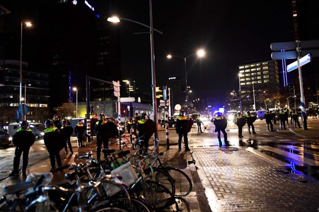 Riot police clear roads after clashes with demonstrators in the streets near the Turkish consulate in Rotterdam, Netherlands March 12, 2017. REUTERS/Dylan Martinez