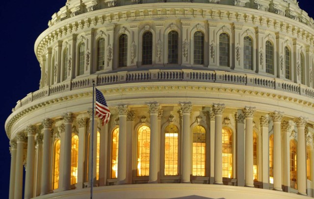 FILE PHOTO: The United States Capitol Dome is seen before dawn in Washington March 22, 2013. REUTERS/Gary Cameron/File photo