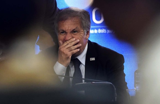 Organization of American States Secretary General Luis Almagro gestures during a meeting with foreign ministers ahead of the OAS 47th General Assembly in Cancun, Mexico, on June 19, 2017. / AFP PHOTO / PEDRO PARDO