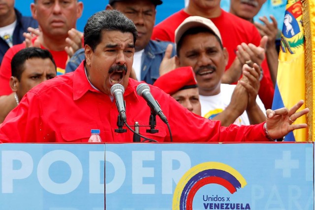 FILE PHOTO: Venezuela’s President Nicolas Maduro delivers a speech during the closing campaign ceremony for the upcoming Constituent Assembly election in Caracas, Venezuela July 27, 2017 . The banner reads "Power". REUTERS/Carlos Garcias Rawlins/File Photo