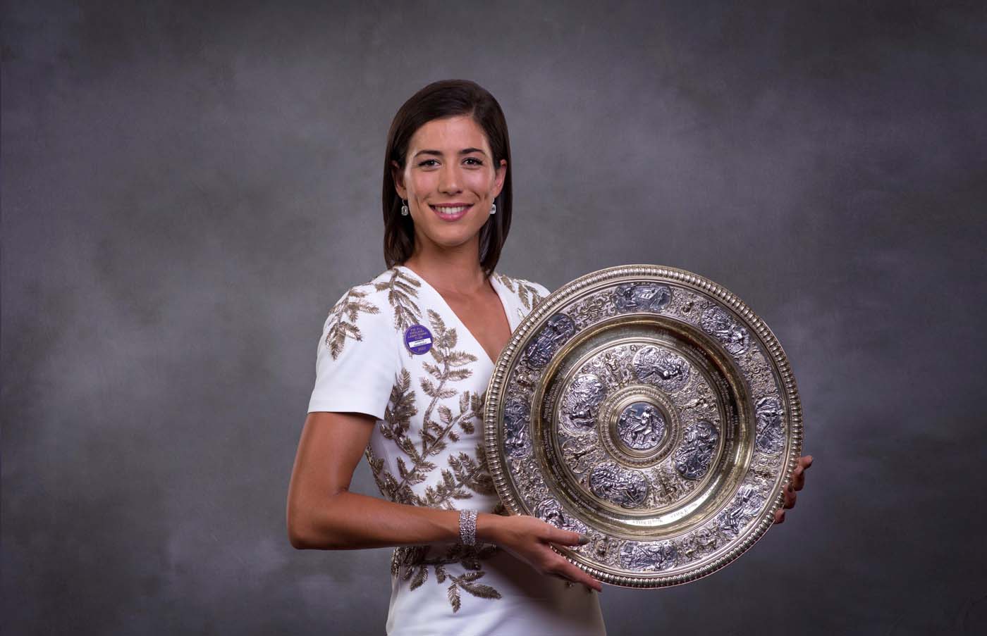 La felicidad de Muguruza resplandece en la cena de campeones de Wimbledon (fotos)