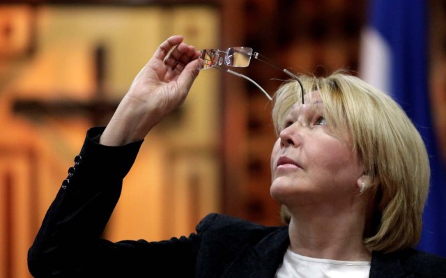 Venezuela's chief prosecutor Luisa Ortega Diaz looks at her glasses during a meeting in defense of the Constitution in Caracas, Venezuela August 6, 2017. REUTERS/Ueslei Marcelino