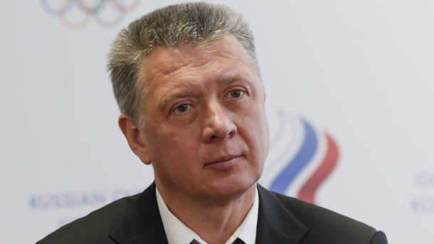 Newly-elected Russian Athletics Federation president Dmitry Shlyakhtin attends a news conference in Moscow, Russia, Saturday, Jan. 16, 2016. The Russian athletics federation elected a politically connected former coach as its new president Saturday as it tries to end the country's suspension from Olympic track and field. Dmitry Shlyakhtin, a regional sports minister in the Samara region of central Russia, was elected unanimously after his main rival withdrew as part of a deal brokered by senior Russian officials. (AP Photo/Pavel Golovkin)