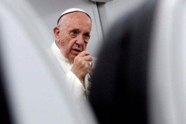 Pope Francis talks to journalists during a press conference aboard a plane flight to Rome at the end of his visit to Colombia, September 11, 2017. REUTERS/Andrew Medichini/Pool