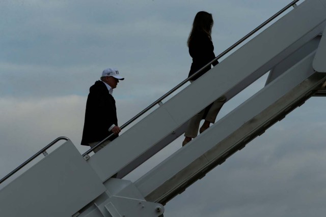 U.S. President Donald Trump and First Lady Melania Trump (R) board Air Force One for travel to view Hurricane Irma response efforts in Florida, from Joint Base Andrews, Maryland, U.S. September 14, 2017. REUTERS/Jonathan Ernst