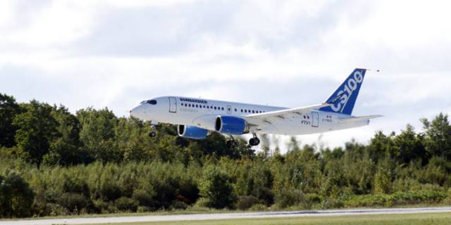 The new bombardier aircraft CSseries is shown in Mirabel, Quebec after take off for the first time on September 16, 2013. Bombardier Inc. carried out final preparations for the maiden flight of its CSeries on September 16, 2013, hoping to translate its ambitions to shatter an Airbus and Boeing duopoly into faster sales of Canada's most ambitious jet. The jet flew from Bombardier's Mirabel factory in Quebec , capping a 5-year $3.4 billion development of the first all-new plane in its class in decades. AFP PHOTO/CLEMENT SABOURIN