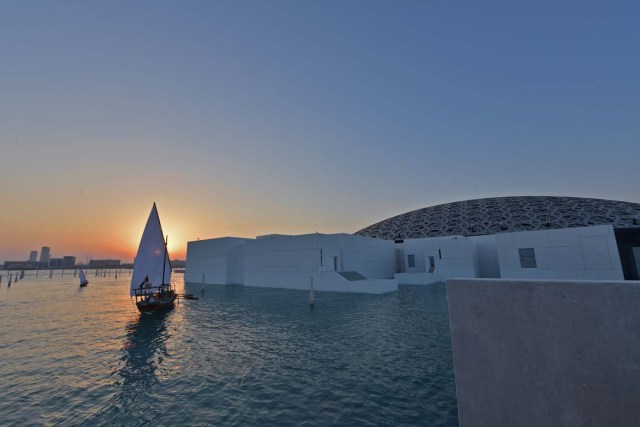 A general view shows part of the Louvre Abu Dhabi Museum designed by French architect Jean Nouvel on November 8, 2017 prior to the inauguration of the museum on Saadiyat island in the Emirati capital. More than a decade in the making, the Louvre Abu Dhabi is opening its doors bringing the famed name to the Arab world for the first time. / AFP PHOTO / Giuseppe CACACE