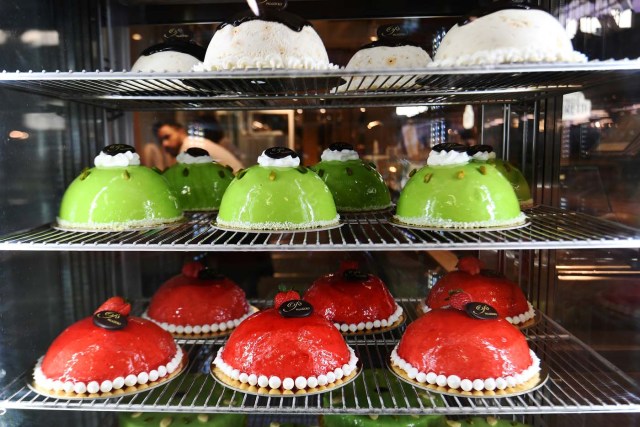 Sweet pastry is on display at a stand during a press tour at FICO Eataly World agri-food park in Bologna on November 9, 2017. FICO Eataly World, said to be the world's biggest agri-food park, will open to the public on November 15, 2017. The free entry park, widely described as the Disney World of Italian food, is ten hectares big and will enshrine all the Italian food biodiversity. / AFP PHOTO / Vincenzo PINTO