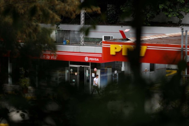 The corporate logo of the state oil company PDVSA is seen at a gas station in Caracas, Venezuela November 16, 2017. REUTERS/Marco Bello