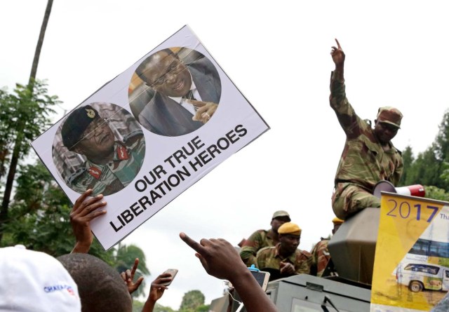 Protesters calling for Zimbabwean President Robert Mugabe to step down take to the streets in Harare, Zimbabwe, November 18, 2017. REUTERS/Philimon Bulawayo