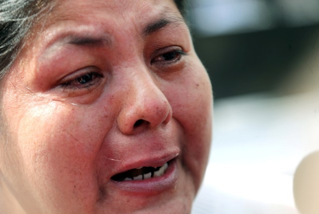 Elena Alfaro, sister of Cristian Ibanez, one of the 44 crew members of the missing at sea ARA San Juan submarine, reacts as she speaks to journalists outside an Argentine naval base in Mar del Plata, Argentina November 22, 2017. REUTERS/Marcos Brindicci