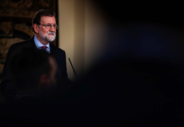 Spain's Prime Minister Mariano Rajoy listens to a questions after delivering his year-end speech at the Moncloa Palace in Madrid, Spain, December 29, 2017. REUTERS/Juan Medina