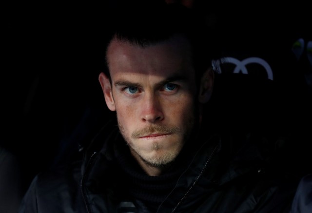 Soccer Football - La Liga Santander - Real Madrid vs FC Barcelona - Santiago Bernabeu, Madrid, Spain - December 23, 2017 Real Madrid’s Gareth Bale looks on from the bench REUTERS/Juan Medina