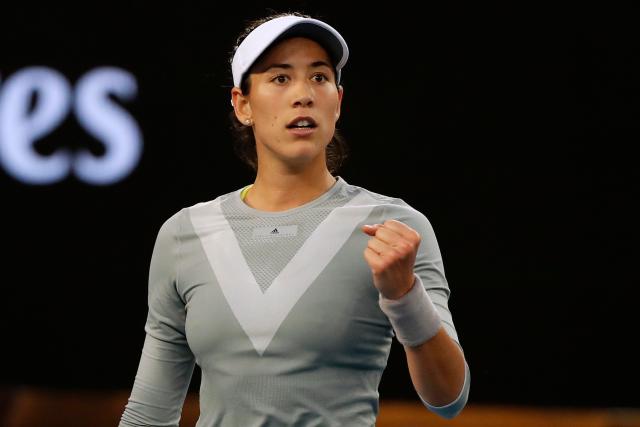 Tennis - Australian Open - Margaret Court Arena, Melbourne, Australia, January 16, 2018. Spain's Garbine Muguruza celebrates winning her match against France's Jessika Ponchet. REUTERS/Issei Kato