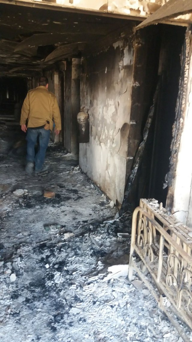 Damaged burned corridor of the Intercontinental Hotel is seen a day after an attack in Kabul, Afghanistan January 22, 2018. REUTERS/Stringer NO RESALES. NO ARCHIVES.