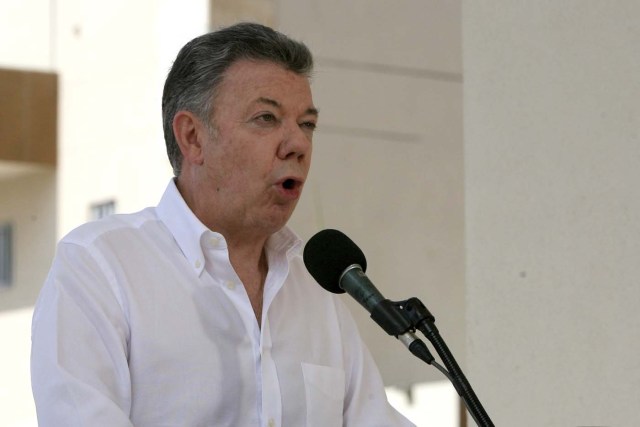 CTG12. CARTAGENA (COLOMBIA), 04/01/2018.- El presidente de Colombia, Juan Manuel Santos, habla durante la reunión de la Comisión de Seguimiento, Impulso, Verificación a la Implementación de los Acuerdos de Paz (CSIVI) hoy, jueves 4 de enero de 2018, en Cartagena (Colombia). A la reunión asistieron miembros del partido político Fuerza Alternativa Revolucionaria del Común y exguerrilleros de las FARC, y los expresidentes del Gobierno español Felipe González y de Uruguay José Mujica. EFE/Ricardo Maldonado Rozo