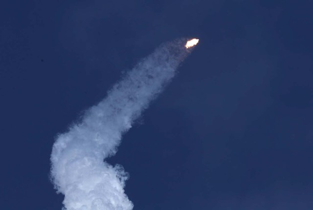 A SpaceX Falcon Heavy rocket trails smoke after lifting off from historic launch pad 39-A at the Kennedy Space Center in Cape Canaveral, Florida, U.S., February 6, 2018. REUTERS/Joe Skipper