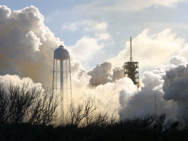 Smoke covers the area after a SpaceX Falcon Heavy rocket lifted off from historic launch pad 39-A at the Kennedy Space Center in Cape Canaveral, Florida, U.S., February 6, 2018. REUTERS/Thom Baur