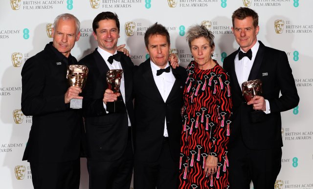 Martin McDonagh, Peter Czernin, Sam Rockwell and Graham Broadbent, pose with Frances McDormand, as they hold their trophies for Best Film for 'Three Billboards Outside Ebbing Missouri' at the British Academy of Film and Television Awards (BAFTA) at the Royal Albert Hall in London, Britain February 18, 2018. REUTERS/Hannah McKay