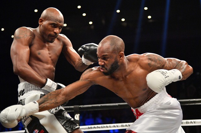 Feb 17, 2018; Las Vegas, NV, USA; Yordenis Ugas (white trunks) and Ray Robinson (black trunks) box during a boxing match at Mandalay Bay Events Center. Mandatory Credit: Joe Camporeale-USA TODAY Sports