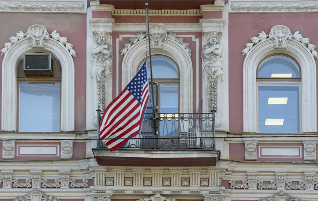 The flag of the United States flies outside the US Consulate building in St.Petersburg on March 30, 2018. Russian Foreign Minister Sergei Lavrov said on March 29, 2018 Moscow would expel 60 US diplomats and close its consulate in Saint Petersburg in a tit-for-tat expulsion over the poisoning of ex-double agent Sergei Skripal. / AFP PHOTO / OLGA MALTSEVA