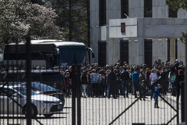 Russian diplomats expelled by the US after a nerve agent attack on a former spy, leave their embassy in Washington, D.C, March 31, 2018.   Along with the family members a total of 171 people will leave the United States on Saturday on two planes. / AFP PHOTO / ZACH GIBSON