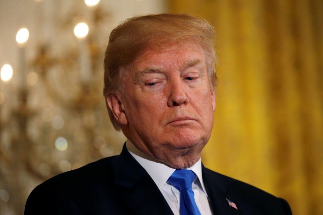 U.S. President Donald Trump takes part in a Greek Independence Day celebration in the East Room at the White House in Washington, U.S., March 22, 2018. REUTERS/Leah Millis