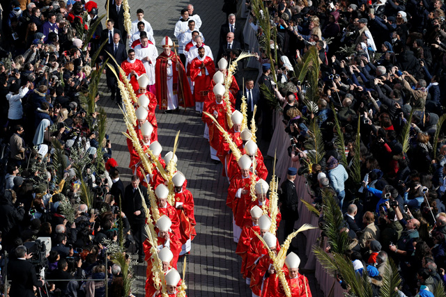 Cardinals arrive to attend the Palm Sunday Mass in Saint Peter's Square at the Vatican, March 25, 2018   REUTERS/Stefano Rellandini