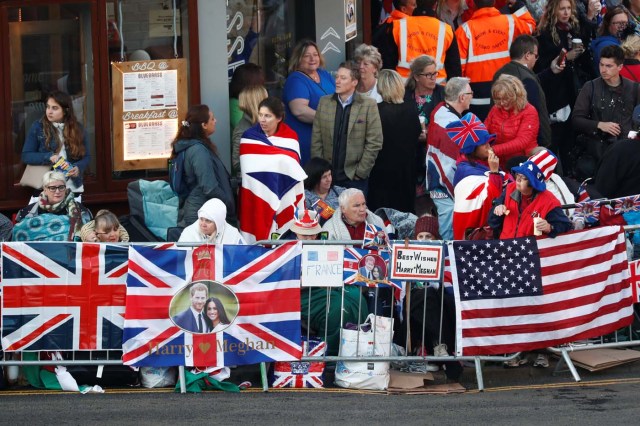 Well-wishers gather outside Windsor Castle on Castle Hill ahead of the wedding and carriage procession of Britain's Prince Harry and Meghan Markle in Windsor, Britain, May 19, 2018. Odd ANDERSEN/Pool via REUTERS