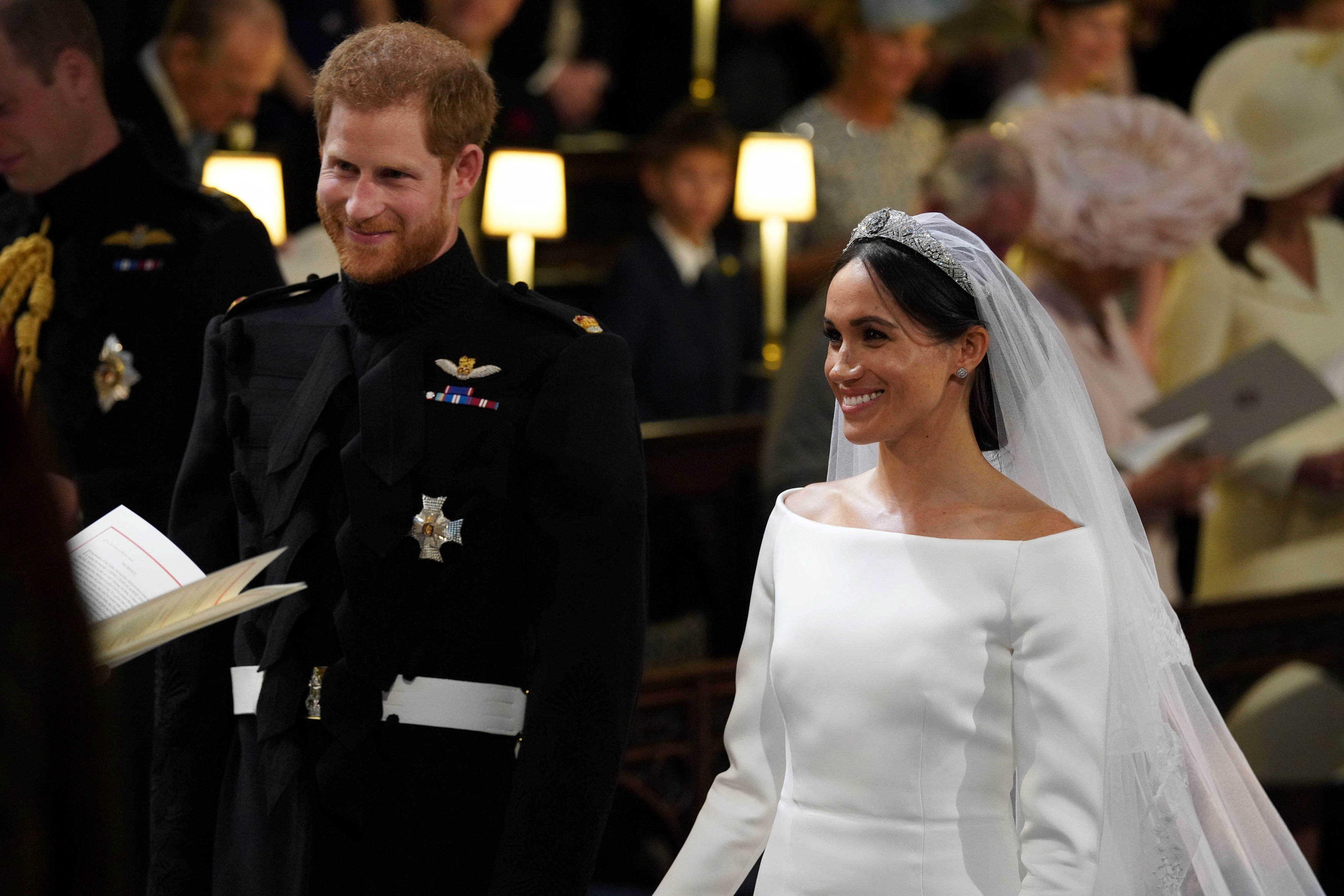 Harry y Meghan sonríen felices al ser declarados marido y mujer (Fotos)